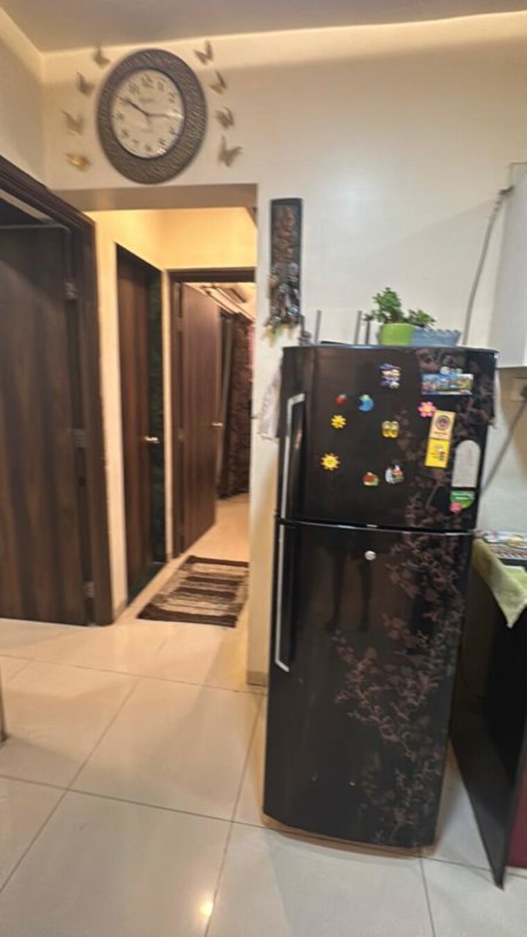 Kitchen, karan-sara 2 Bedroom 1000 Sq.Ft. Apartment In Baner Pune 10591474