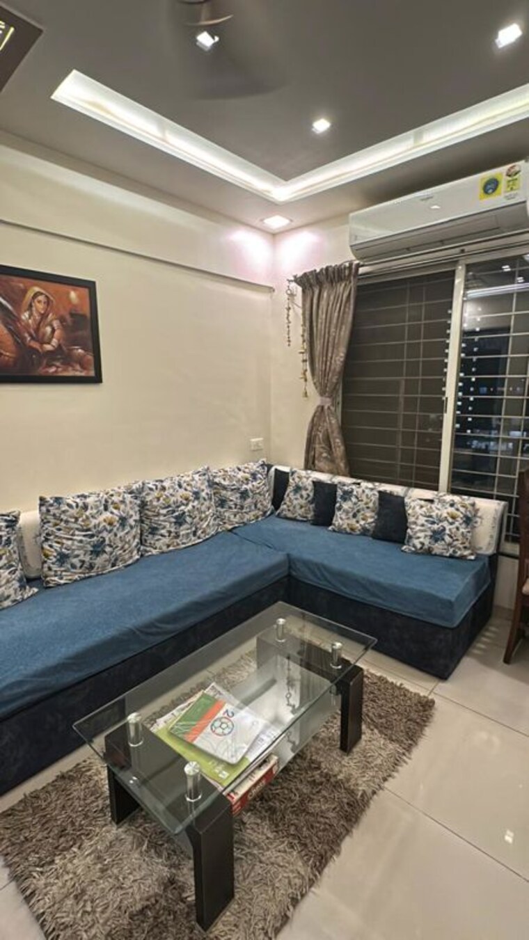Living Room, karan-sara 2 Bedroom 1000 Sq.Ft. Apartment In Baner Pune 10591474