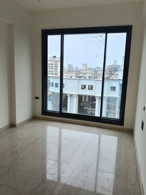 Room in 2 BHK Apartment at MS Gateway, Juhu Road – for Rent