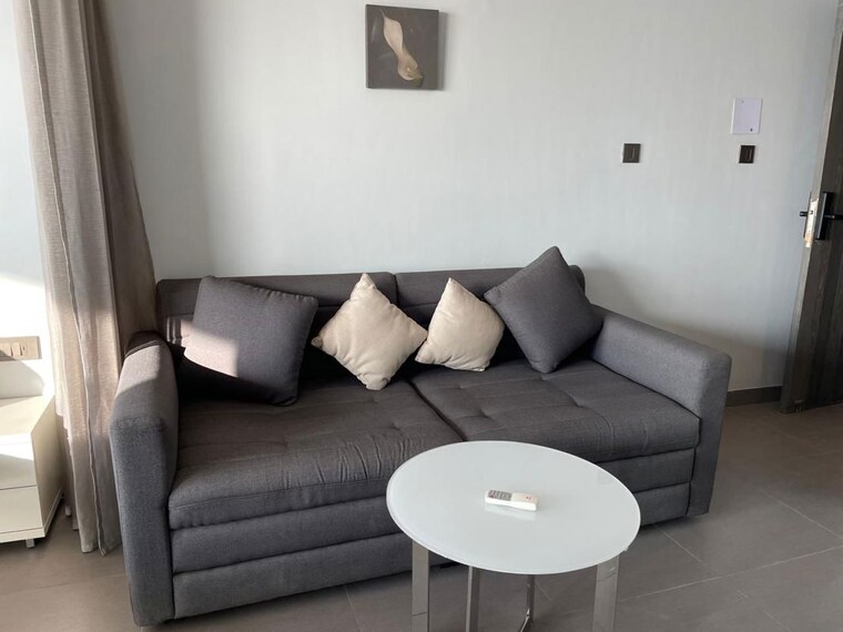 Living Room, supertech-supernova-nova-residences 1 Bedroom 630 Sq.Ft. Apartment In Sector 94 Noida 10491712