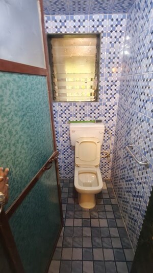 Bathroom in 1 BHK Apartment at Eden Woods complex, Manpada – for Rent