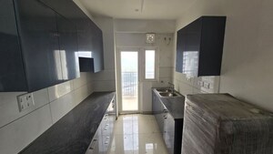 Kitchen in 2 BHK Apartment at Ratan Pearls, Sector 16 Greater Noida – for Sale