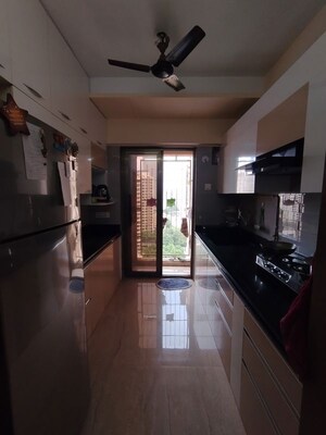 Kitchen in 2 BHK Apartment at Madhav Palacia, Ghodbunder Road – for Rent