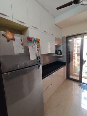 Kitchen in 2 BHK Apartment at Madhav Palacia, Ghodbunder Road – for Rent