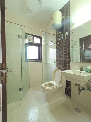 Bathroom in 3 BHK Builder Floor at Pamposh Enclave – for Sale