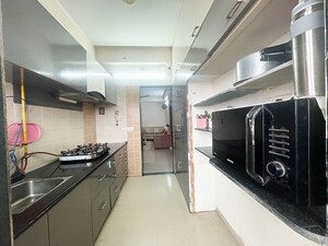 Kitchen in 2 BHK Apartment at Jivraj Park – for Sale