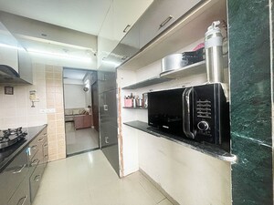 Kitchen in 2 BHK Apartment at Jivraj Park – for Sale