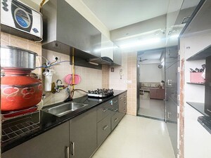 Kitchen in 2 BHK Apartment at Jivraj Park – for Sale