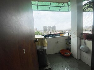 Kitchen in 2 BHK Apartment at Jivraj Park – for Sale