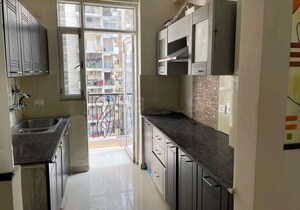Kitchen in 3 BHK Apartment at Prateek Wisteria, Sector 77 – for Rent