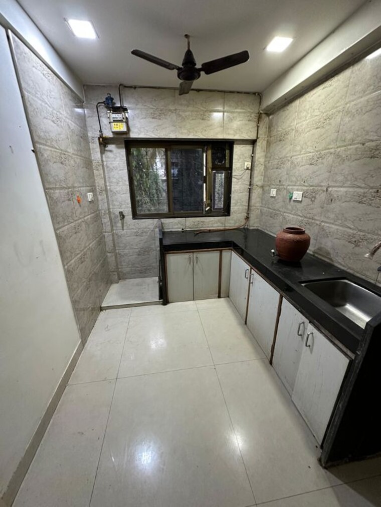 Kitchen, yashodhan-apartments-andheri 2 Bedroom 700 Sq.Ft. Apartment In Andheri West Mumbai 10591773