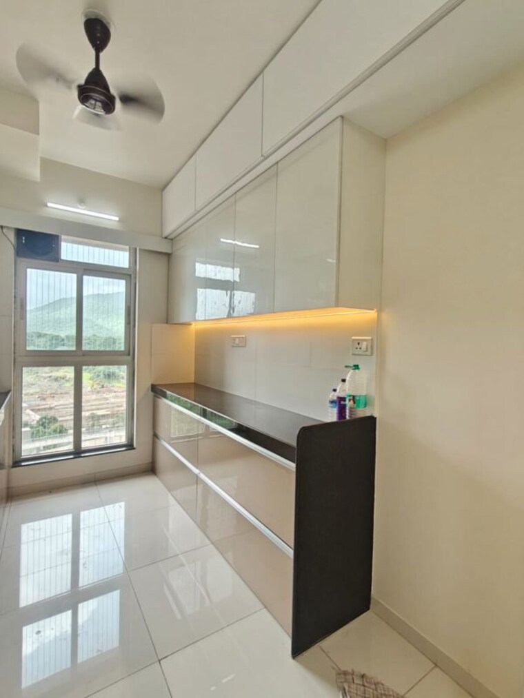 Kitchen, godrej-emerald 2 Bedroom 920 Sq.Ft. Apartment In Ghodbunder Road Thane 10591839