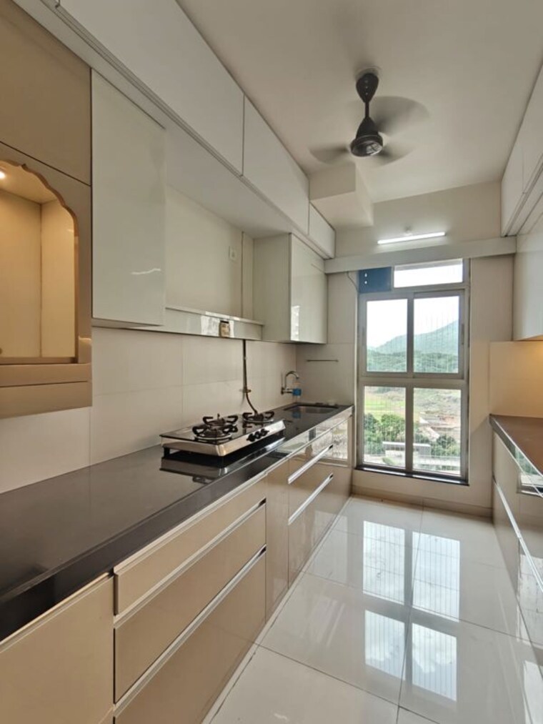 Kitchen, godrej-emerald 2 Bedroom 920 Sq.Ft. Apartment In Ghodbunder Road Thane 10591839