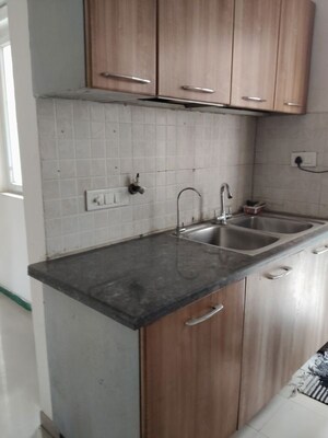 Kitchen in 3.5 BHK Apartment at 3C Lotus Boulevard, Sector 100 – for Rent