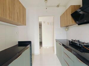 Kitchen in 1.5 BHK Apartment at Godrej Emerald Vista, Ghodbunder Road – for Rent