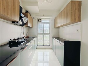 Kitchen in 1.5 BHK Apartment at Godrej Emerald Vista, Ghodbunder Road – for Rent