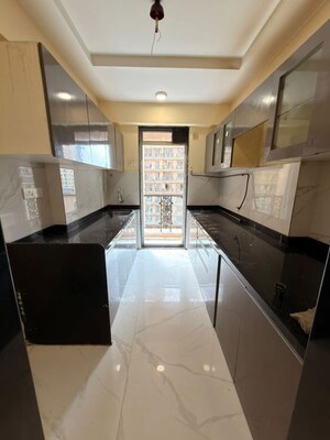 Kitchen in 2 BHK Apartment at JK Iris, Mira Road – for Rent