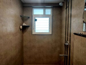 Bathroom in 2 BHK Apartment at Puravankara Silversands, Mundhwa – for Rent