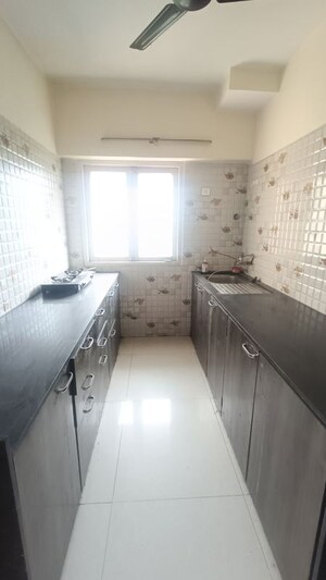 Kitchen in 3 BHK Apartment at Shiv Shakti Complex, Andheri West – for Rent