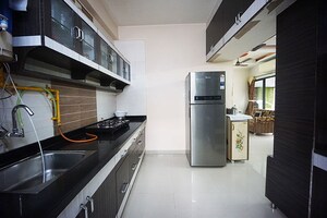 Kitchen in 2 BHK Apartment at Sola – for Sale