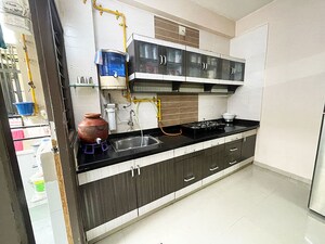 Kitchen in 2 BHK Apartment at Sola – for Sale