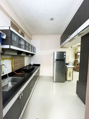 Kitchen in 2 BHK Apartment at Sola – for Sale