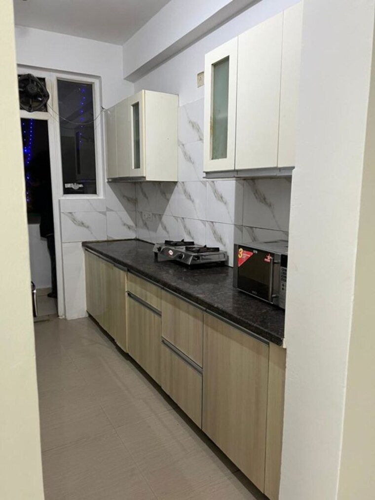Kitchen, nk-savitry-enclave 2 Bedroom 1350 Sq.Ft. Apartment In Vip Road Zirakpur 10592202
