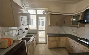 Kitchen in 3 BHK Apartment at Affinity Greens, International Airport Road – for Sale