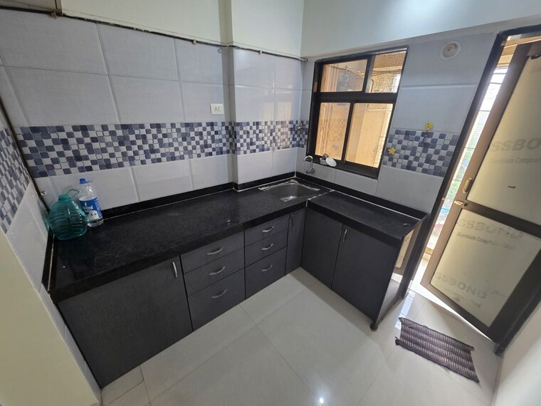 Kitchen, uma-neopolis 1 Bedroom 450 Sq.Ft. Apartment In Ghodbunder Road Thane 10592268