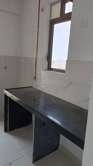 Kitchen in 1 BHK Apartment at Raymond Ten X Habitat, Pokhran Road No Two – for Sale