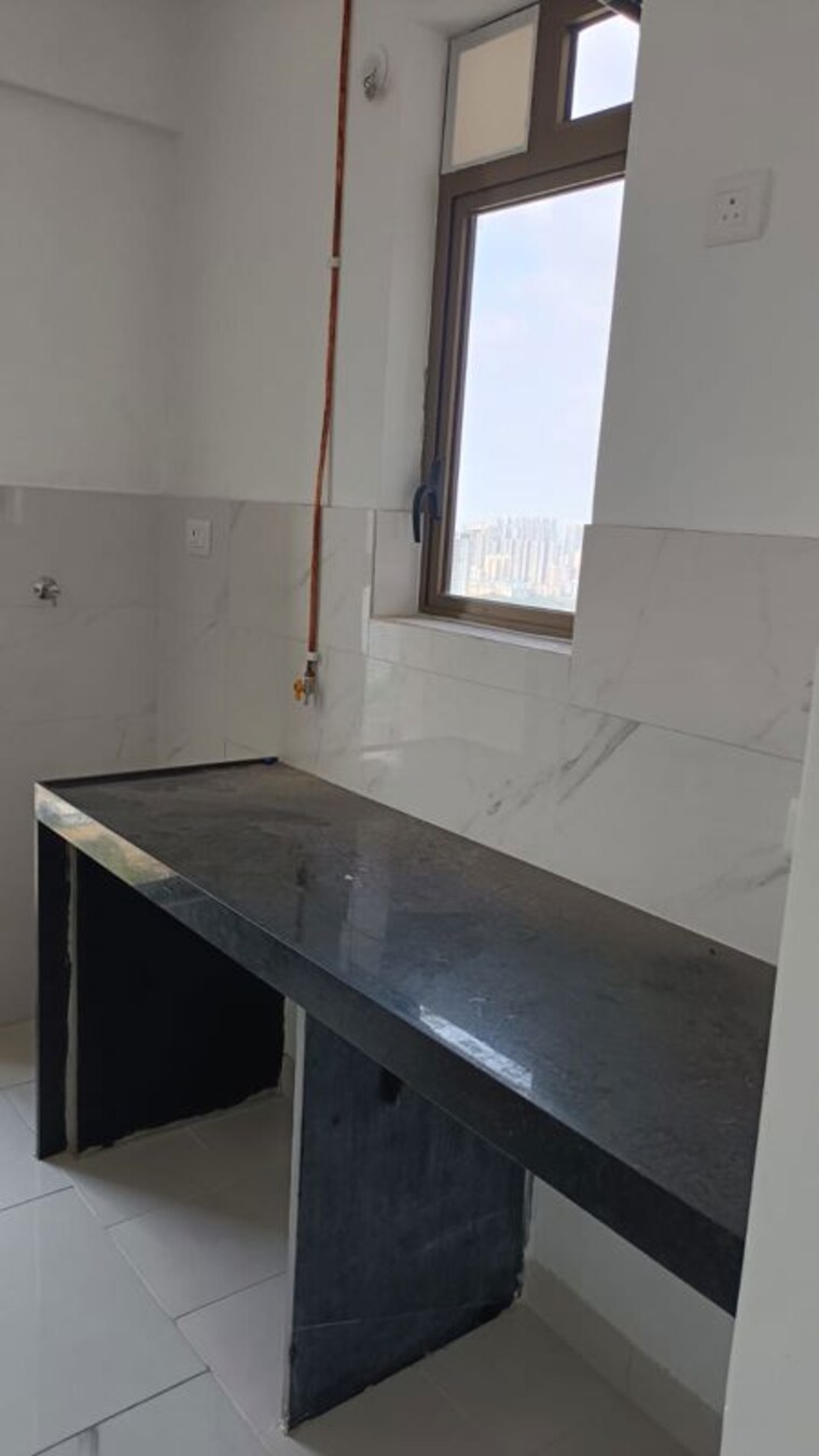 Kitchen, raymond-ten-x-habitat 1 Bedroom 550 Sq.Ft. Apartment In Pokhran Road No Two Thane 10592271