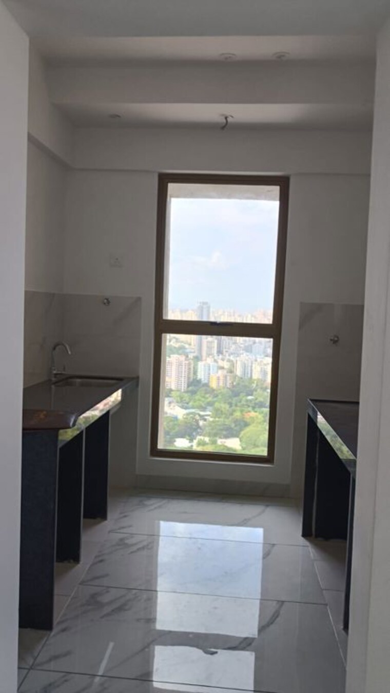 Kitchen, raymond-ten-x-habitat 1 Bedroom 550 Sq.Ft. Apartment In Pokhran Road No Two Thane 10592271