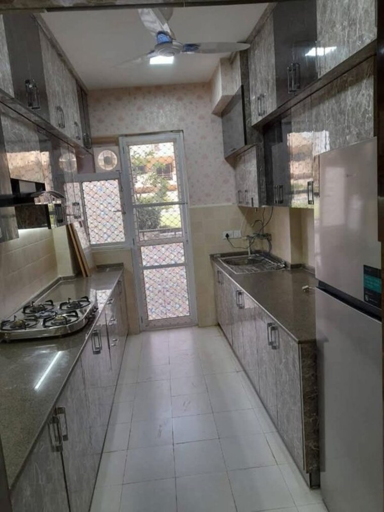 Kitchen, satya-the-hermitage 2 Bedroom 1460 Sq.Ft. Apartment In Sector 103 Gurgaon 10592286