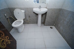 Bathroom in 2 BHK Apartment at Supertech Crown Town, Sector 74 – for Rent