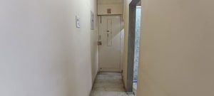 Building Lobby in 2 BHK Apartment at Suchidham Complex, Goregaon East – for Sale