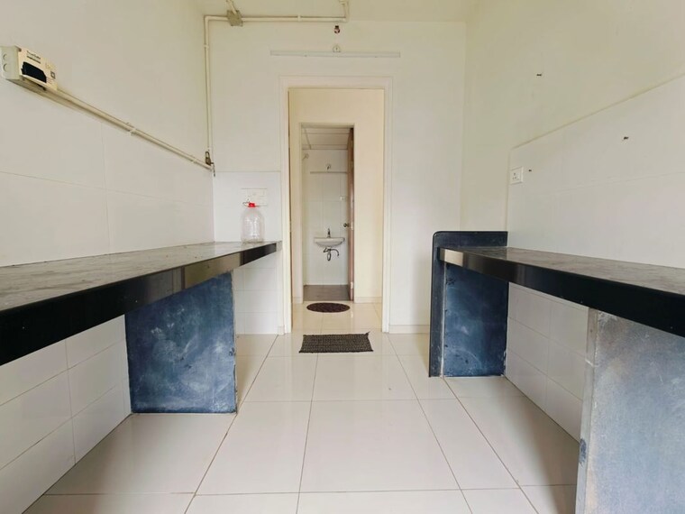 Kitchen, godrej-emerald 2 Bedroom 708 Sq.Ft. Apartment In Ghodbunder Road Thane 10592330