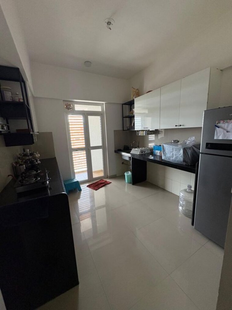 Kitchen, lodha-belmondo 2.5 Bedroom 1262 Sq.Ft. Apartment In Gahunje Pune 10592349