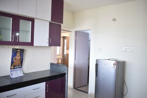 Kitchen in 2 BHK Apartment at Jalan Aura County Pune, Wagholi – for Rent