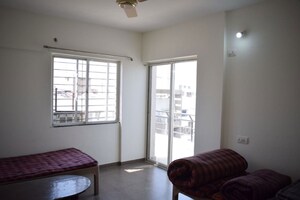 Living Room in 2 BHK Apartment at Jalan Aura County Pune, Wagholi – for Rent