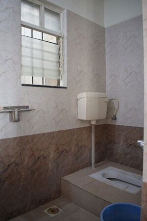 Bathroom in 2 BHK Apartment at Jalan Aura County Pune, Wagholi – for Rent