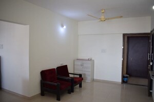 Living Room in 2 BHK Apartment at Jalan Aura County Pune, Wagholi – for Rent