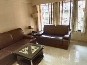 Living Room in 1 BHK Apartment at Bandra West – for Rent