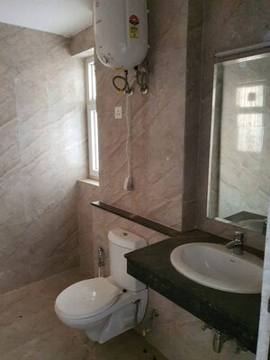 Bathroom in 3 BHK Apartment at Adani M2K Oyster Grande, Sector 102 – for Sale