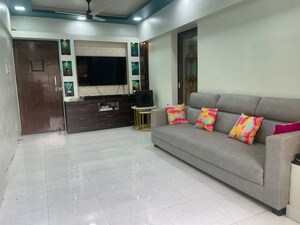 Living Room in 2 BHK Apartment at Globe Heights, Goregaon East – for Rent