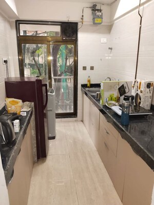 Kitchen in 1 BHK Apartment at Je And Vee Om Trimurti, Malad East – for Rent