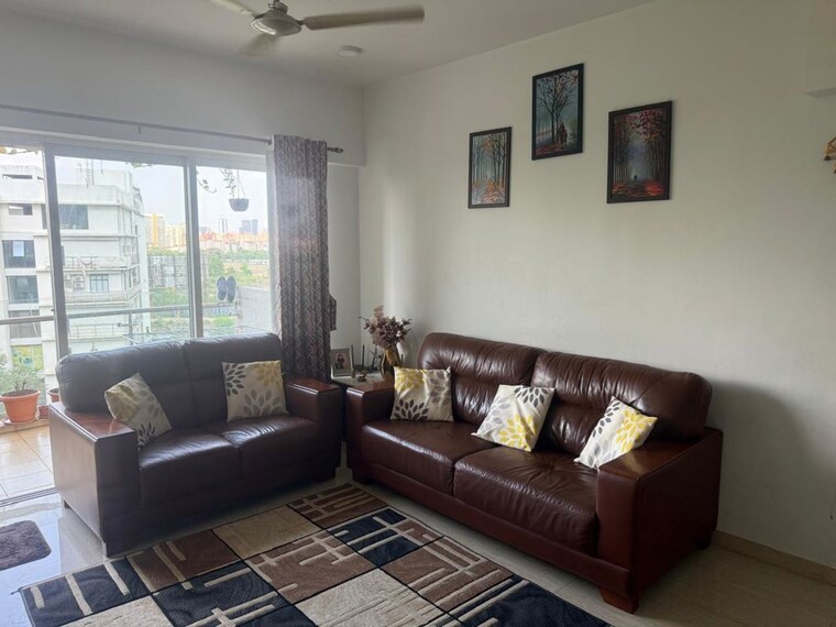 Living Room, lodha-belmondo 2 Bedroom 998 Sq.Ft. Apartment In Gahunje Pune 10592394