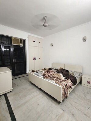 Bedroom in 3 BHK Builder Floor at Ansal Sushant Lok I, Sector 43 – for Rent