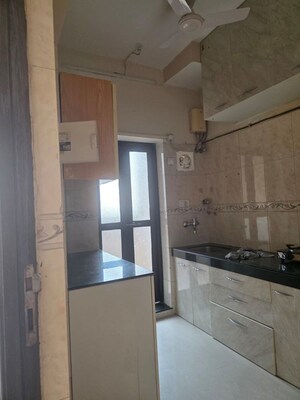 Kitchen in 1 BHK Apartment at K Raheja Heights, Malad East – for Rent