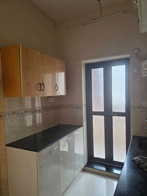 Kitchen in 1 BHK Apartment at K Raheja Heights, Malad East – for Rent