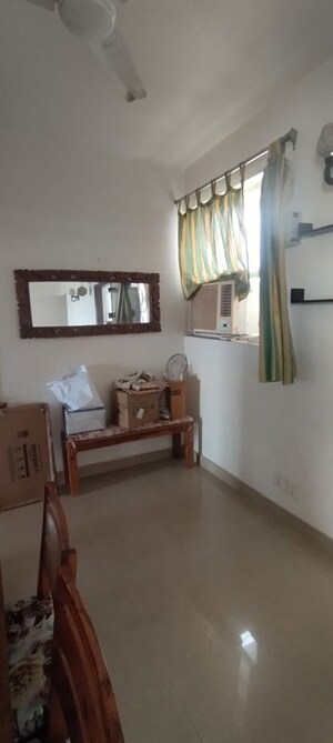 Living Room in 2 BHK Apartment at Ramprastha Skyz, Sector 37d – for Rent